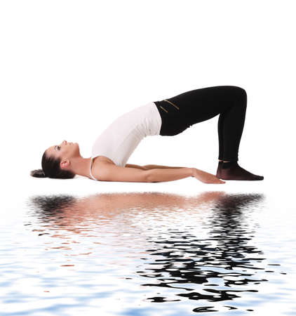 healthy young slim woman practising yoga exercise