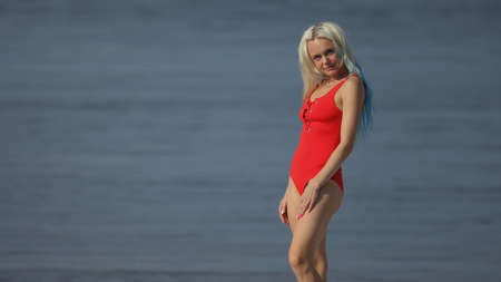 Beautiful woman in bikini on the beachの写真素材