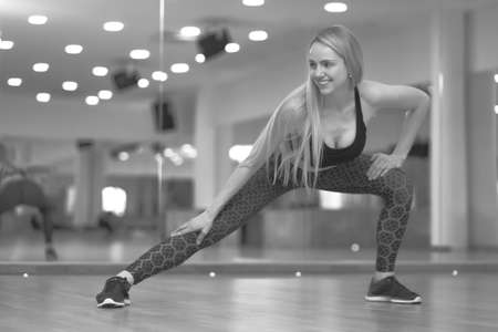 athletic woman working out in the gym