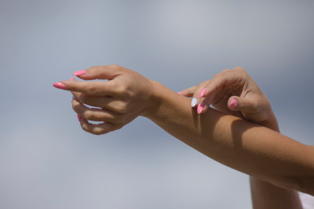 beautiful female hands with manicure on nailsの写真素材
