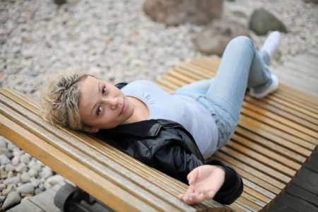 portrait of a young blonde woman outdoor