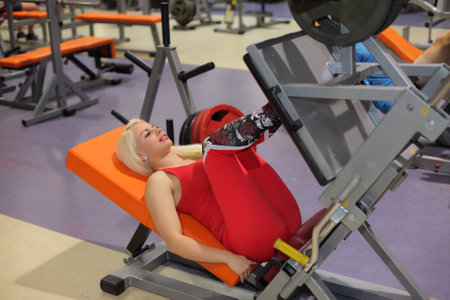 young beautiful fitness woman with muscular body