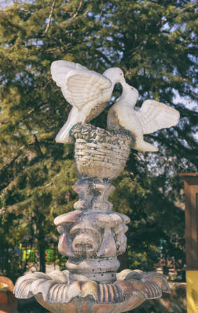 Statue of pigeons City park Dayの写真素材