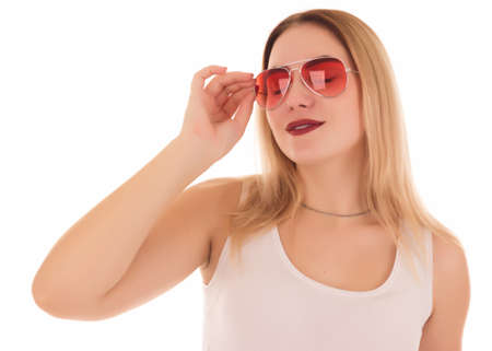Young pretty woman, sunglasses, studioの写真素材