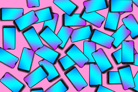 Pink background with black smarphones lying in a chaotic order.の写真素材