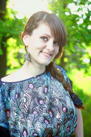 Closeup portrait of a beautiful smiling young womanの写真素材