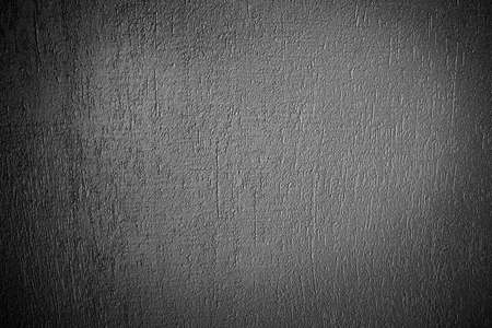 Grain black dark paint wall background or textureの写真素材