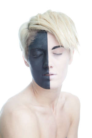 women wearing makeup with split face at an halfの写真素材