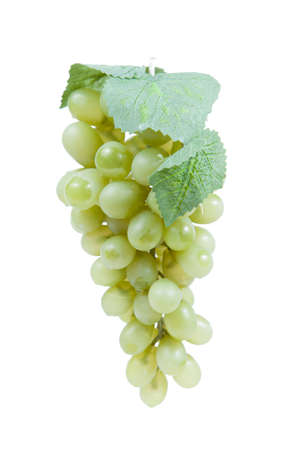Fake plastic grapes banch on white backgroundの写真素材