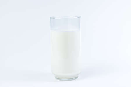 Glass of milk isolated on white backgroundの写真素材