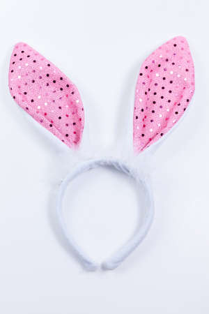 pink Bunny Ears in white background for girlsの写真素材