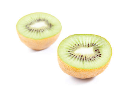 the ripe kiwi isolated on white backgroundの写真素材