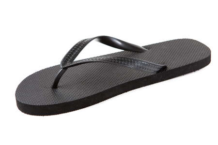Black flip-flops isolated against a white backgroundの写真素材
