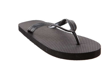 Black flip-flops isolated against a white backgroundの写真素材