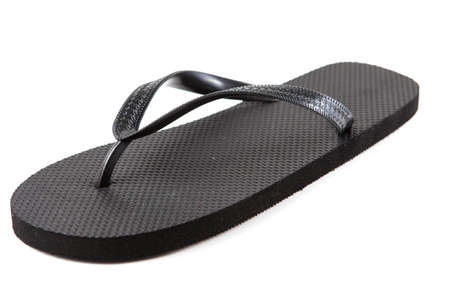 Black flip-flops isolated against a white backgroundの写真素材