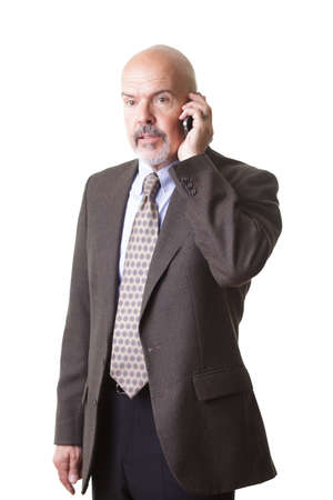 businessman in suit talking on phone isolated on white backgroundの写真素材