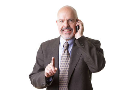 businessman in suit talking on phone isolated on white backgroundの写真素材