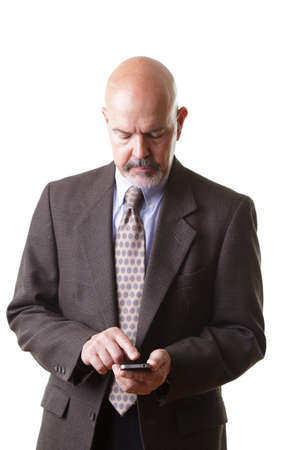 businessman in suit holding smartphone isolated on white backgroundの写真素材