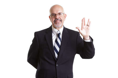 businessman in dark blue suit and glasses  showing live long and prosper isolated on white...