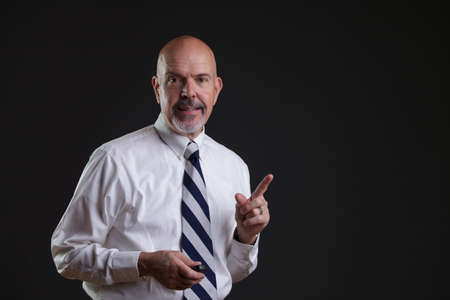 Businessman in white shirt and big strip tie i have got idea lookの写真素材