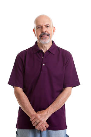 Portrait of mature man in purple polo shirt isolated on whiteの写真素材