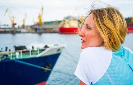 Cruise ship woman relaxing view from boat of port. summer, travel,