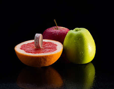 Fitness equipment. Healthy food. grapefruit , water, apple fresh clear fruits sport powerの写真素材