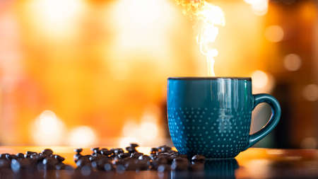 Splash of coffee and milk in white cup isolated on black background movement action arabica, aroma,...