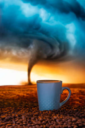 Splash of coffee and milk in white cup isolated on black background movement actionの写真素材