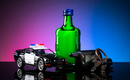 Silhouette of an alcoholic in despair despair, anonymous, problem, bottle, depressed, distilled, crystal, blue, celebrate, flutes, bartender, colorful golden reflection liquid mixing pouring preparation holding whisky womenの写真素材