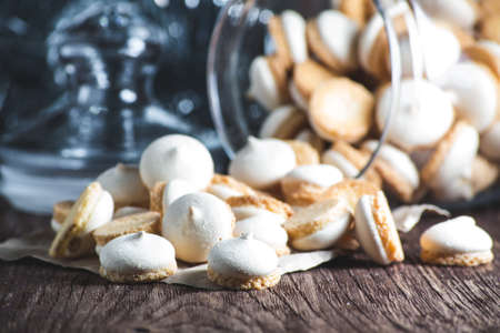 Homemade meringue on dark wooden tableの写真素材