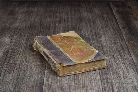 Old books on wood backgroundの写真素材