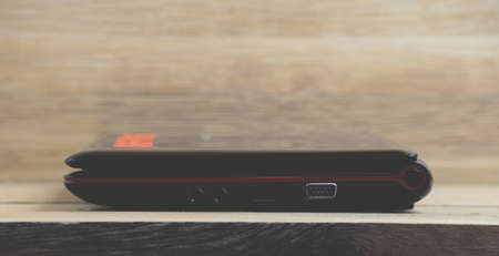 Laptop on wood backgroundの写真素材