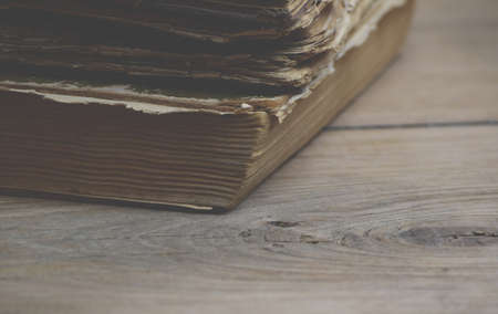 Old books on wood backgroundの写真素材
