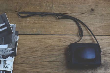 Retro camera on wood backgroundの写真素材