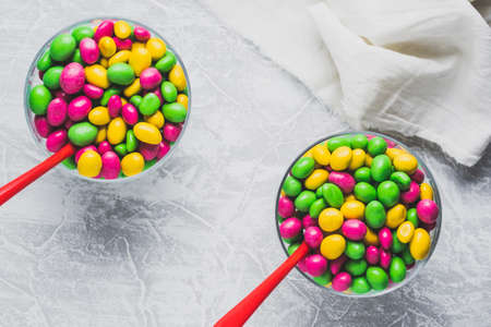 Colorful candies on a light background