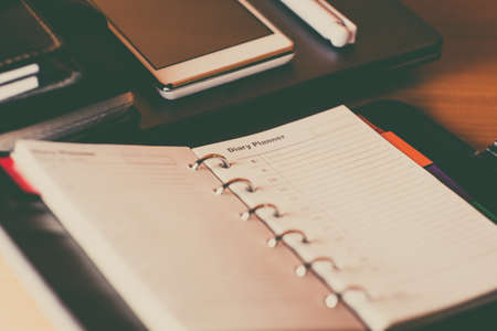 Daily planner on the workplace