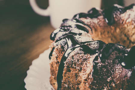 Fresh baked cake on a dark backgroundの写真素材