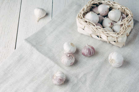 Dried garlic on a light wooden backgroundの写真素材