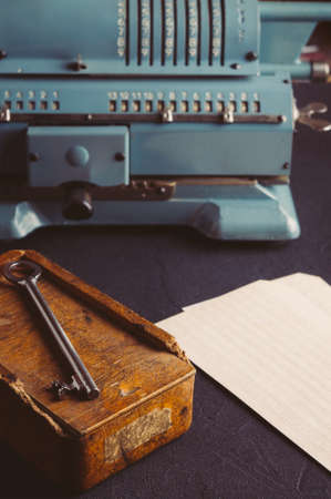Old adding machine. Picture in dark styleの写真素材