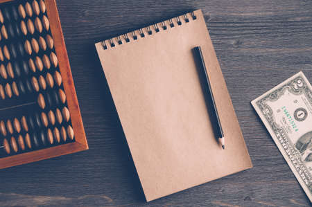 Old wooden abacus concept of bookkeeping, business or saving moneyの写真素材