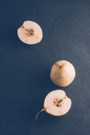 Fresh pears on a dark background. Selective focusの写真素材