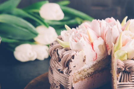 Cups of tea and cake on a dark backgroundの写真素材