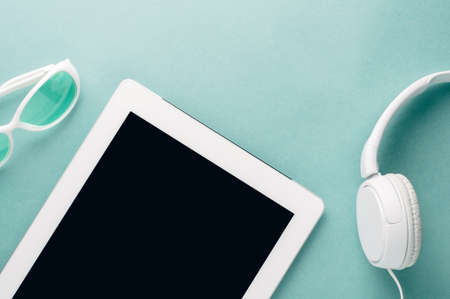 Tablet PC on a green backgroundの写真素材