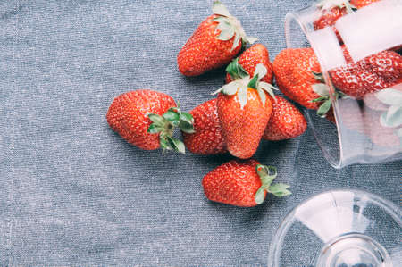 Ripe strawberry on a dark backgroundの写真素材