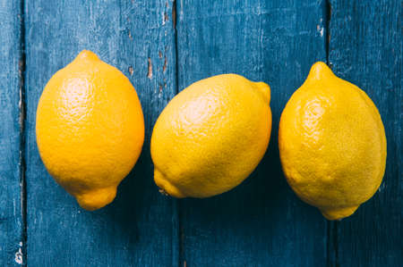 Lemons on blue backgroundの写真素材
