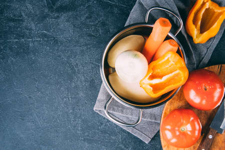 Fresh washed vegetables in the pan. Dark style shotの写真素材