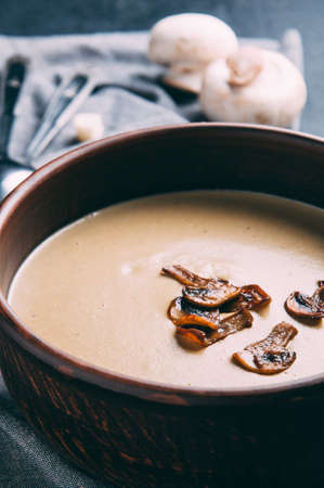Cream soup of mushrooms on a dark backgroundの写真素材