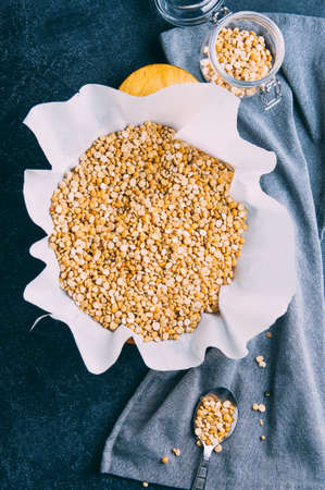 Dried peas on a dark background