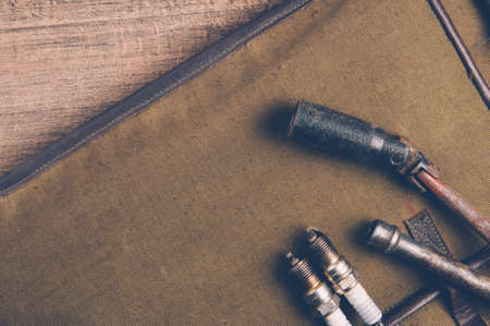 Old wrenches and auto parts. The concept of the garage